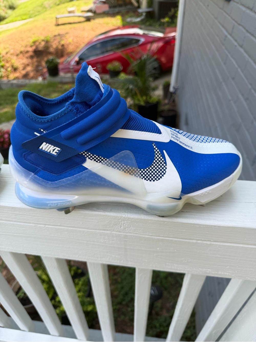 These are Nike Force Zoom Mike Trout 7 baseball cleats in a vibrant